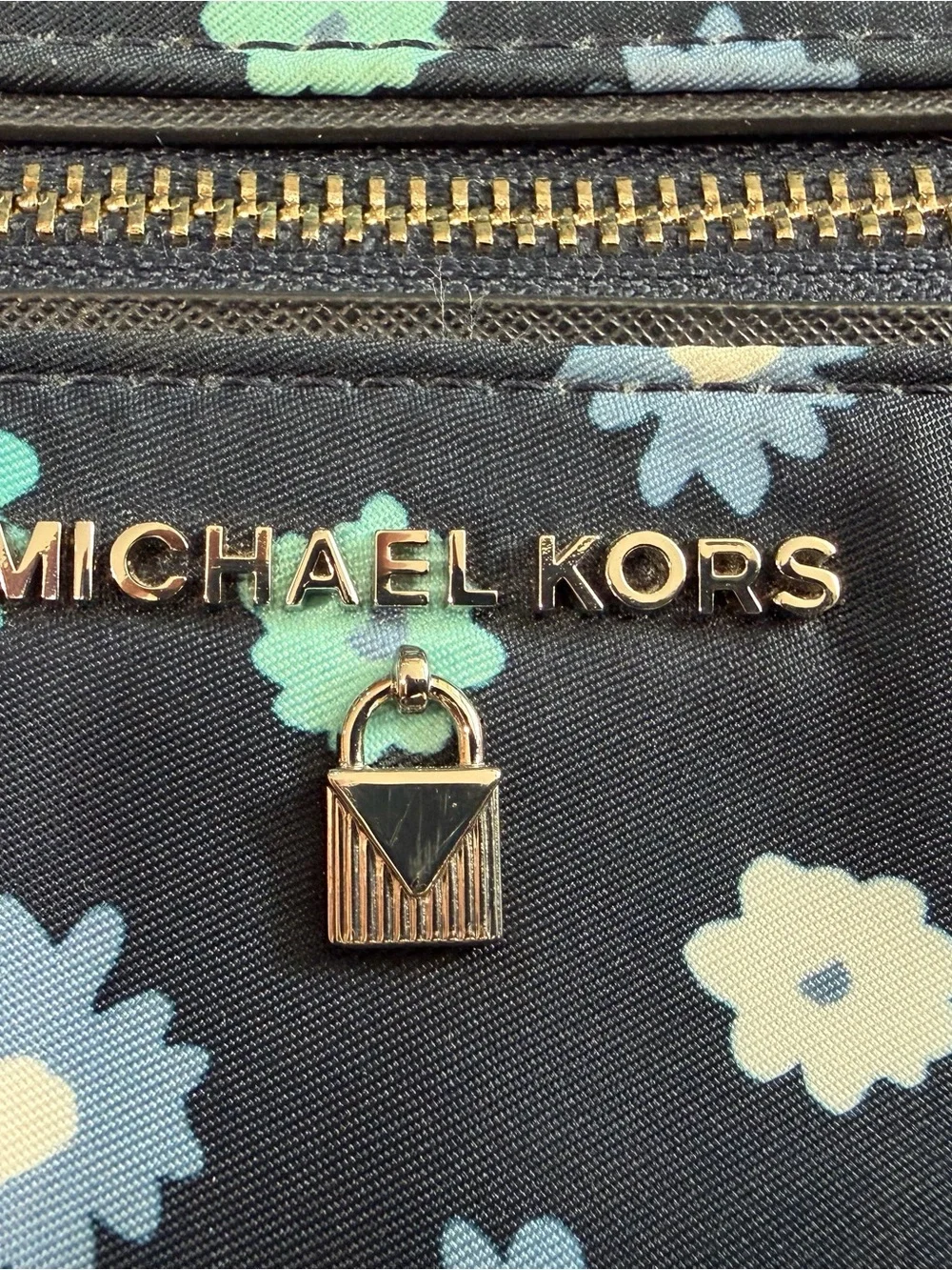 Michael Kors Navy Floral Mini Backpack with Teal and Light Blue Accents